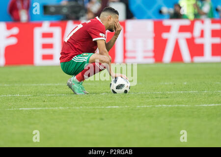Younes BELHANDA (MAR) is disappointed, showered, decapitation, disappointment, sad, frustrated, frustrated, latex, full figure, Morocco (MAR) - Iran (IRN) 0: 1, Preliminary Round, Group B, Game 4, on 15.06.2018 in St. Petersburg; Football World Cup 2018 in Russia from 14.06. - 15.07.2018. | usage worldwide Stock Photo