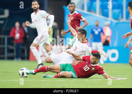 Omid EBRAHIMI (ob., IRN) vs. Younes BELHANDA (MAR), Action, duels, Morocco (MAR) - Iran (IRN) 0: 1, Preliminary Round, Group B, Game 4, on 06/15/2018 in St.Petersburg; Football World Cup 2018 in Russia from 14.06. - 15.07.2018. | usage worldwide Stock Photo