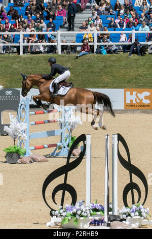 Bolesworth, Cheshire, UK. 16th Jun, 2018.  Show jumper Lauren Crooks riding Surrimo (Competition S14-CS12 Grand Prix) at the Equerry Bolesworth International Horse Show. Credit MediaWorldImages/AlamyLiveNews Stock Photo