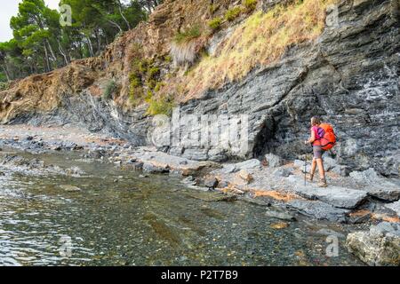 Spain, Catalonia, hiking from Cerbere in France to Llança in Spain on the GR 92 and European long distance path E 12, Colera, Camino de Ronda to Garbet beach Stock Photo