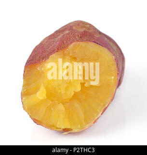 Whole purple yams photographed on a white background. Stock Photo