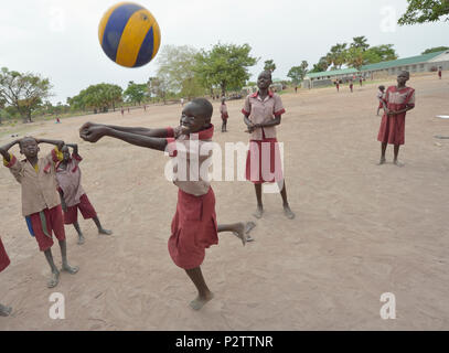 Students play volleyball in the Loreto Primary School in Rumbek, South Sudan. Stock Photo