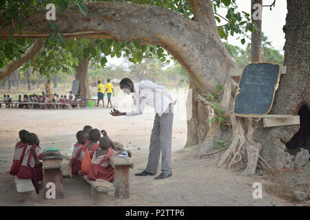 A class under a tree at the Loreto Primary School in Rumbek, South Sudan. Stock Photo