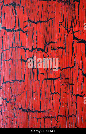 Red painted cracked old wood art background and texture Stock Photo