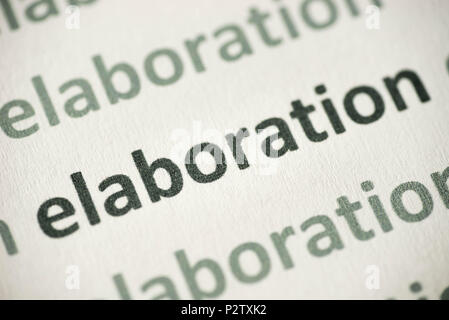 word elaboration printed on white paper macro Stock Photo
