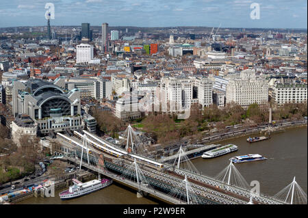 Aerial view of Hungerford Bridge, and Golden Jubilee Bridges, two cable-stayed pedestrian bridges over the River Thames in London, England, UK