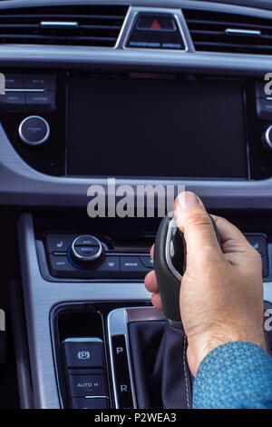 hand on the gearshift lever Stock Photo