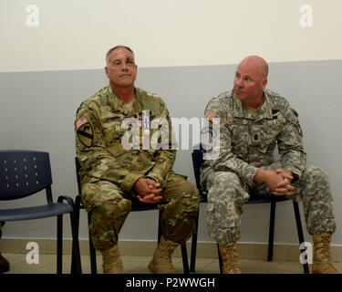 Command Sgt. Maj. Harley J. Schwind Jr. (left) relinquished responsibilities as the command senior enlisted leader to Command Sgt. Maj. David W. Nunn during a ceremony on Camp Butmir, Bosnia and Herzegovina (BiH), Aug. 2, 2016. Stock Photo