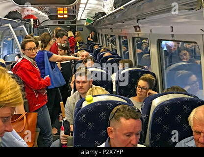 Busy, Overcrowded Scotrail Class 158 train on borders railway Edinburgh to Tweedbank Stock Photo