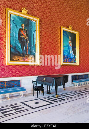 OSLO, NORWAY - APRIL 12, 2010: The banquet hall in City Hall of Oslo. The portraits of King of Norway Harald V and Queen of Norway Sonja Stock Photo