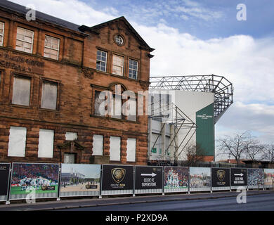 GLASGOW, SCOTLAND - NOVEMBER 28th 2013: The old London school and Celtic Park in Parkhead. Stock Photo