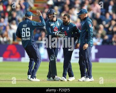 England's Adil Rashid (centre) celebrates with Joe Root (left) Jos Buttler (second left) and Jason Roy (right) after taking the wicket of Australia's Aaron Finch during the One Day International match at the SSE SWALEC Stadium, Cardiff. Stock Photo