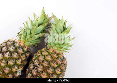 two big pineapples on a white background closeup Stock Photo