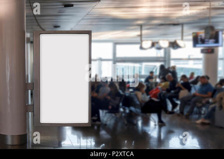 Blank billboard mock up in an airport, with unfocused background Stock Photo