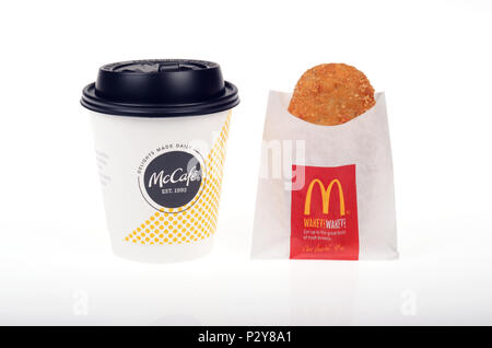 McDonald’s coffee cup and hash brown potato patty in wrapper isolated on white backgroundBreakfast Stock Photo