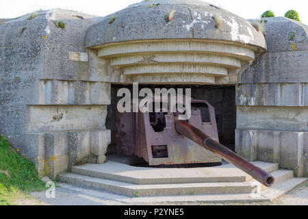 Longues-sur-Mer, Normandy, France, May 15, 2018, Remains of the german Battery which was captured on June 07 1944, Bunker and Artillery Guns Stock Photo