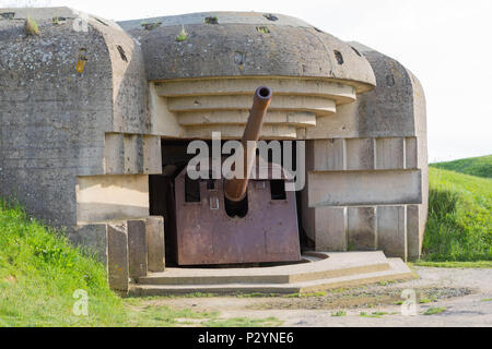 Longues-sur-Mer, Normandy, France, May 15, 2018, Remains of the german Battery which was captured on June 07 1944, Bunker and Artillery Guns Stock Photo