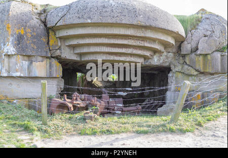 Longues-sur-Mer, Normandy, France, May 15, 2018, Remains of the german Battery which was captured on June 07 1944, Bunker and Artillery Guns Stock Photo