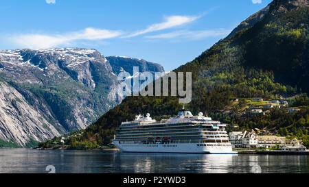 Eidfjord, Norway - May 21, 2018: Travel documentary of everyday life and place. The cruise ship Viking Sun visiting the village on a sunny and calm da Stock Photo