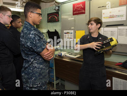 USS Bonhomme Richard (LHD 6) Silors visit Emukae Kindergarten. 161221