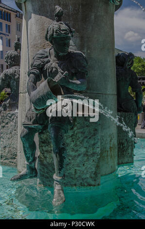 The Fish Fountain, or as it is called in Germen, Fischbrunnen, is a small fountain at the North-East corner of Marienplatz. Stock Photo