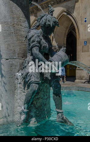 The Fish Fountain, or as it is called in Germen, Fischbrunnen, is a small fountain at the North-East corner of Marienplatz. Stock Photo