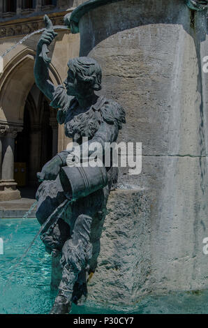 The Fish Fountain, or as it is called in Germen, Fischbrunnen, is a small fountain at the North-East corner of Marienplatz. Stock Photo