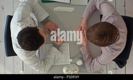 Timelapse Team of doctors having a meeting in medical office. Top view Stock Photo