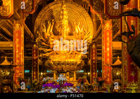 Gold Buddha Statue in the Bai Dinh Pagoda temple complex, Trang An, Ninh Binh Stock Photo