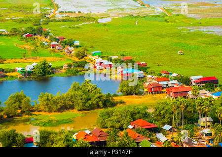 Floating village Phnom Krom, green rice fields, Tonle Sap, Siem Reap, Cambodia Stock Photo