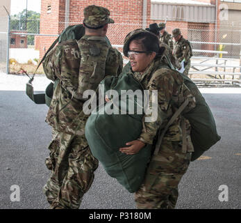 New Soldiers arriving for their first day of Basic Combat Training, Aug. 19, with Company F, 1st Battalion, 34th Infantry Regiment on Fort Jackson, S.C. are 'welcomed' by drill sergeants from both the U.S. Army and U.S. Army Reserve. The reserve drill sergeants are from the 98th Training Division  (IET), 108th Training Command (Initial Entry Training) currently fulfilling their 29-day annual training commitment. (U.S. Army Reserve photo by Sgt. 1st Class Brian Hamilton/ released) Stock Photo