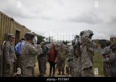U.S. Army Military Police soldiers from 603rd Military Police Battalion and 535th Military Battalion conduct role playing scenarios at a Theater Internment Facility (TIF) in support of Operation Global Medic on Fort McCoy, Wis. on August 19, 2016. Nearly 11,000 service members from across the country are participating in the 86th Training Division's Combat Support Training Exercise at Fort McCoy, Wis. More than 100 units from across the Army, the Air Force, the Navy, the Marines, and the Canadian Army are training at the 84th Training Command's final exercise of 2016. (U.S. Army Photo by Sgt.  Stock Photo