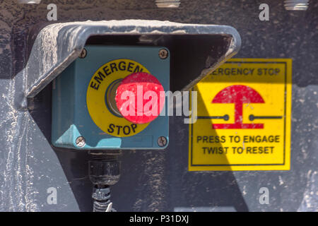 Emergency stop button on heavy machinery in Utah Valley Stock Photo