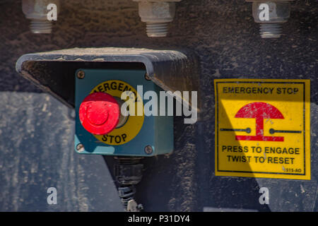 Emergency stop button on heavy machinery in Utah Valley Stock Photo