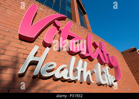 Signage for the Vitality health insurance company outside the company's building in Bournemouth. Stock Photo