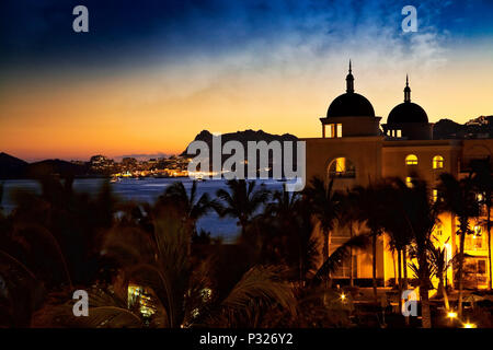 Cabo San Lucas lights up at dusk.  Baja, Mexico. Stock Photo