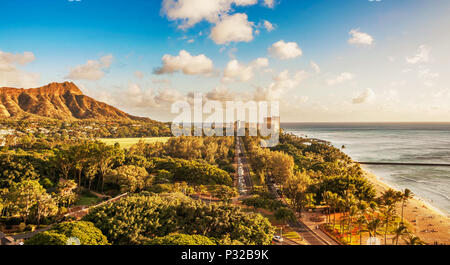 Aerial view of Diamond Head Crater and Queen's surf beach on the Hawaiian island of Oahu in Honolulu. Stock Photo