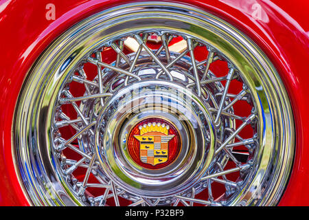 Emblem and spare wheel cover on the rear of a Cadillac convertible circa 1955 Stock Photo