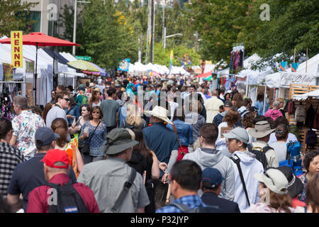 Seattle, Washington, USA, 16 June 2018. Thousands gather at the Fremont Fair Craft Market. The beloved neighborhood street festival takes place during the iconic Fremont Solstice Parade put on by the Fremont Arts Council. The annual craft market benefits the Fremont Chamber of Commerce, a non-profit organization that supporting public art and promotes business, and education opportunities in Fremont. Credit: Paul Christian Gordon/Alamy Live News Stock Photo