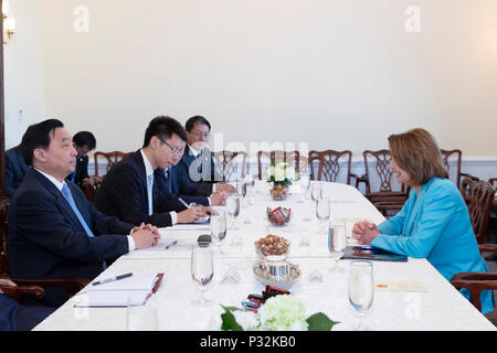 Washington, DC, USA. 14th June, 2018. Wang Chen (1st L), a member of the Political Bureau of the Communist Party of China (CPC) Central Committee and vice chairman of the Standing Committee of the National People's Congress (NPC), meets with U.S. House Minority Leader Nancy Pelosi (R) in Washington, DC, the United States, on June 14, 2018. Wang visited the United States from June 13 to 16 at the invitation of the U.S. Congress to promote bilateral ties. Credit: Li Muzi/Xinhua/Alamy Live News Stock Photo