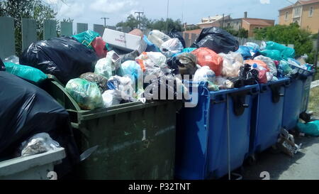 Corfu, Greece, 17 June 2018. Growing concern to health in Corfu, Greece as refuse collections have not been made in many areas for over two months due to dispute with local residents over landfill operations Credit: AMANDA YOUNG/Alamy Live News Stock Photo