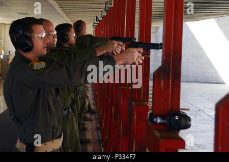 Combat arms instructors from the 349th Security Forces Squadron tally ...