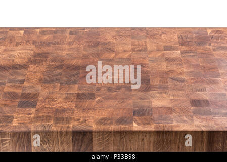 Empty wooden butcher table isolated on white. Stock Photo