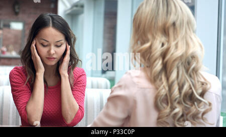 Friends is tired after learning, relaxing in cafe Stock Photo