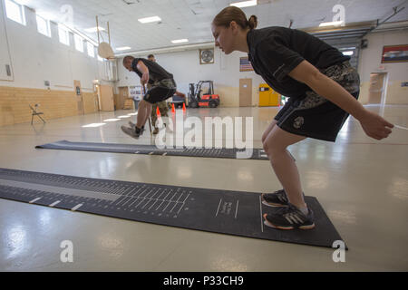 Missouri National Guard recruits participate in the standing long