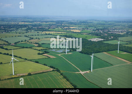 Aerial view of wind turbines on farmland near Clacton on Sea. Stock Photo