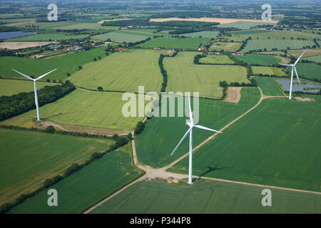 Aerial view of wind turbines on farmland near Clacton on Sea. Stock Photo