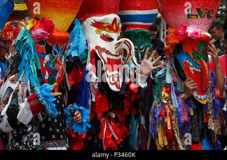 Thailand. 16th June, 2018. Thais wear masks representing the spirits of the dead springing back to life at the annual Phi Ta Khon, or Ghost festival in Dan Sai, Loei province, northeast of Bangkok on June 16, 2018. The event was held to promote tourism in Thailand. Credit: Chaiwat Subprasom/Pacific Press/Alamy Live News Stock Photo