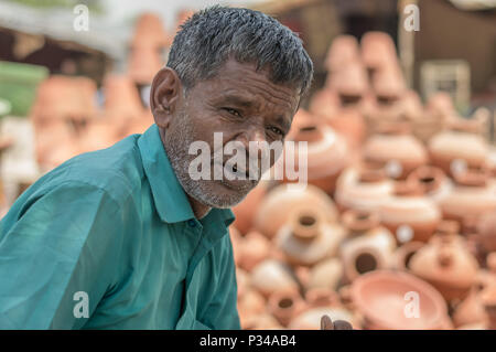 Gurgaon, India, 2018, a man selling earthen pots in the streets of the city. Stock Photo