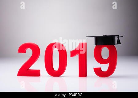 Year 2019 With Graduation Hat On White Background Stock Photo